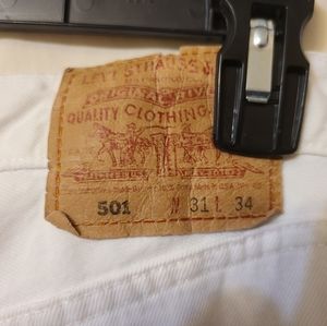 Vintage Levi's 501 Size 31 button fly white jeans